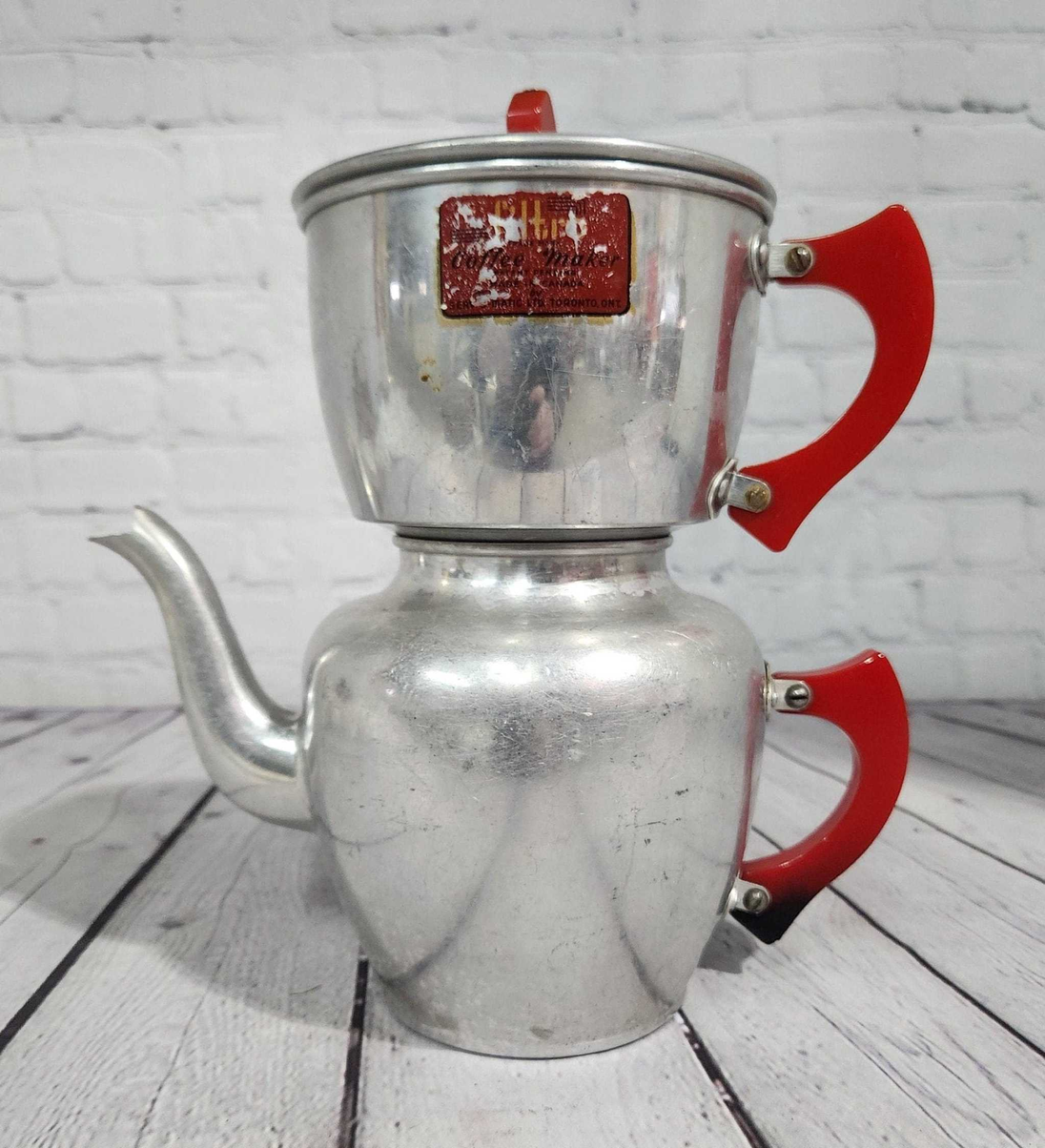 Art deco mid  century modern drip coffee pot / tea pot  with red bakelArt Deco Mid Century Modern drip coffee pot / tea pot with red bakelite handlescute vintage aluminum coffee pot with red Bakelite handleThis is a very cute Filtro drChas Vintage ShopArt deco mid century modern drip coffee pot / tea pot