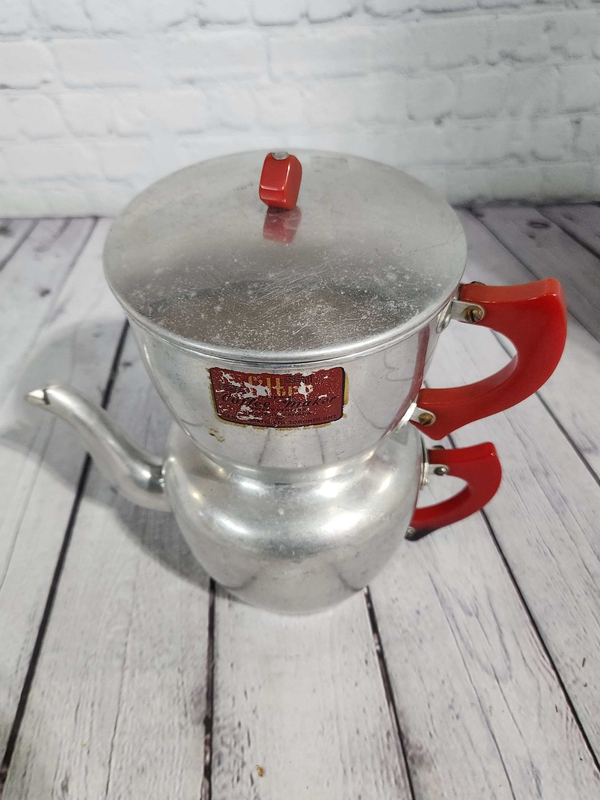 Art deco mid  century modern drip coffee pot / tea pot  with red bakelArt Deco Mid Century Modern drip coffee pot / tea pot with red bakelite handlescute vintage aluminum coffee pot with red Bakelite handleThis is a very cute Filtro drChas Vintage ShopArt deco mid century modern drip coffee pot / tea pot