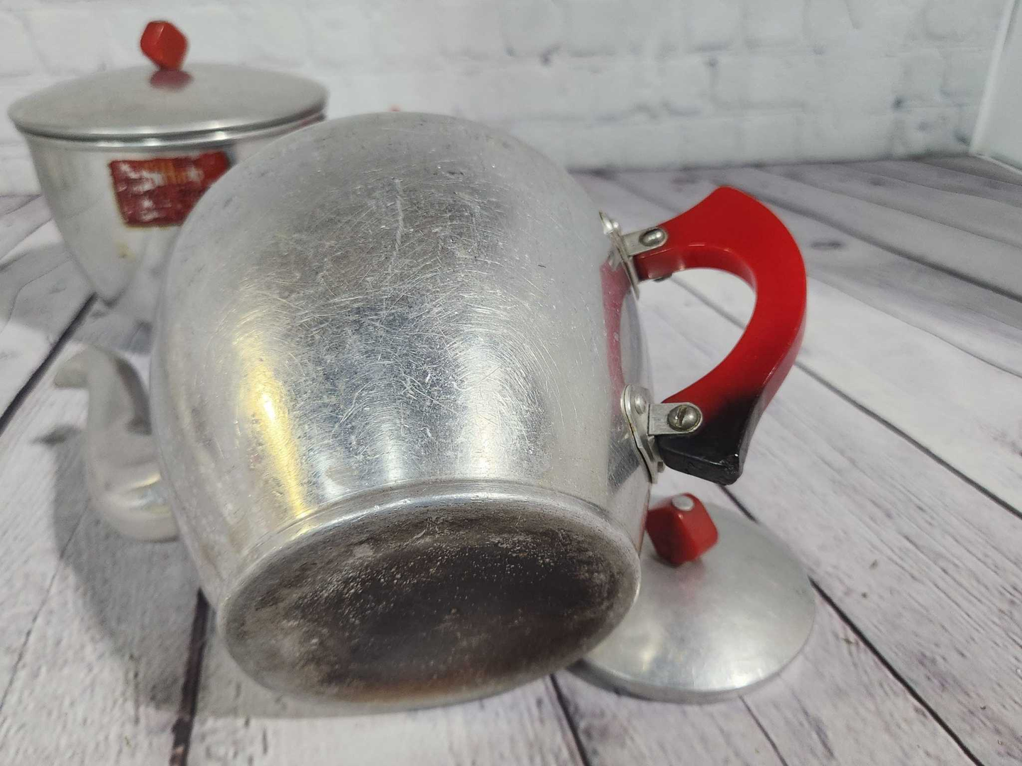 Art deco mid  century modern drip coffee pot / tea pot  with red bakelArt Deco Mid Century Modern drip coffee pot / tea pot with red bakelite handlescute vintage aluminum coffee pot with red Bakelite handleThis is a very cute Filtro drChas Vintage ShopArt deco mid century modern drip coffee pot / tea pot