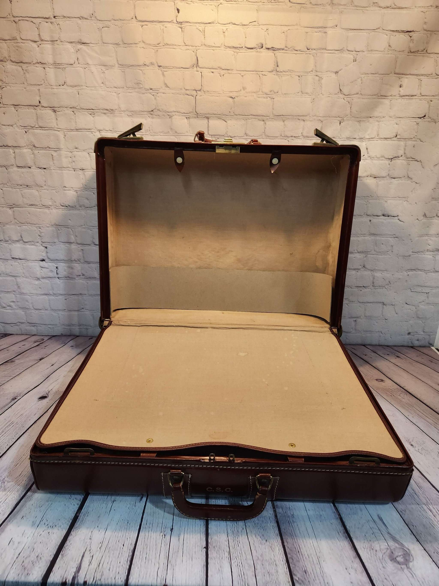 Vintage brown leather suitecase large size vintage suitcase  mid centuVintage brown leather suitecase Large size vintage suitcase Mid Centurysuitecase with protective canvas. Canada Cowhide vintage suitcaseThis vintage, heavy-duty, luxChas Vintage ShopVintage brown leather suitecase large size vintage suitcase mid century suitecase