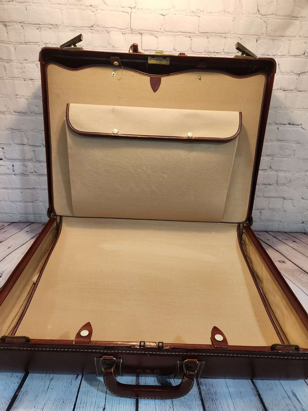 Vintage brown leather suitecase large size vintage suitcase  mid centuVintage brown leather suitecase Large size vintage suitcase Mid Centurysuitecase with protective canvas. Canada Cowhide vintage suitcaseThis vintage, heavy-duty, luxChas Vintage ShopVintage brown leather suitecase large size vintage suitcase mid century suitecase