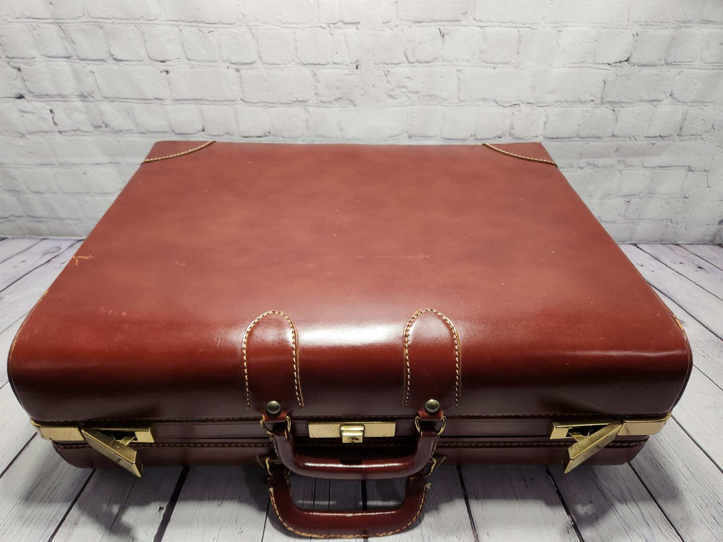 Vintage brown leather suitecase medium size vintage suitcase  mid centVintage brown leather suitecase Medium size vintage suitcase Mid Centurysuitecase with protective canvas. Canada top grain cowhide vintage suitcaseThis vintage, heavChas Vintage ShopVintage brown leather suitecase medium size vintage suitcase mid century suitecase