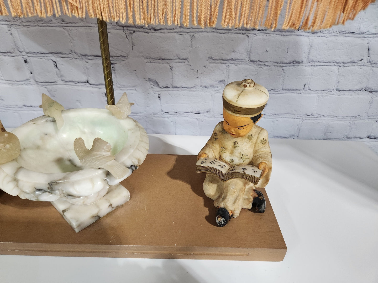 Kitsch vintage chinese lamp 1950's lampKitsch vintage chinese lamp lamp in the shape of a made in the 50s /60This vintage beauty has marble sculpted kids, birds and water fountain !Cool center piece decorChas Vintage ShopKitsch vintage chinese lamp 1950'