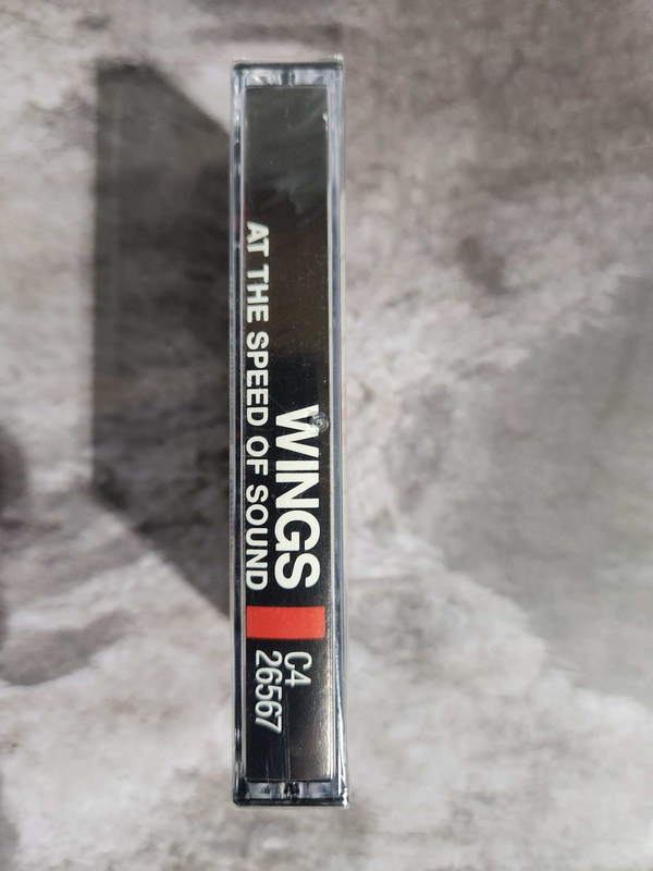 New and sealed paul mccartney wings at the speed of sound  cassette blPaul McCartney, Wings at the speed of sound NEW SEALED cassette !Black Label editionTrack list :Let 'Em In
The Note You Never Wrote
She's My Baby
Beware My Love
WinoChas Vintage Shopsealed paul mccartney wings