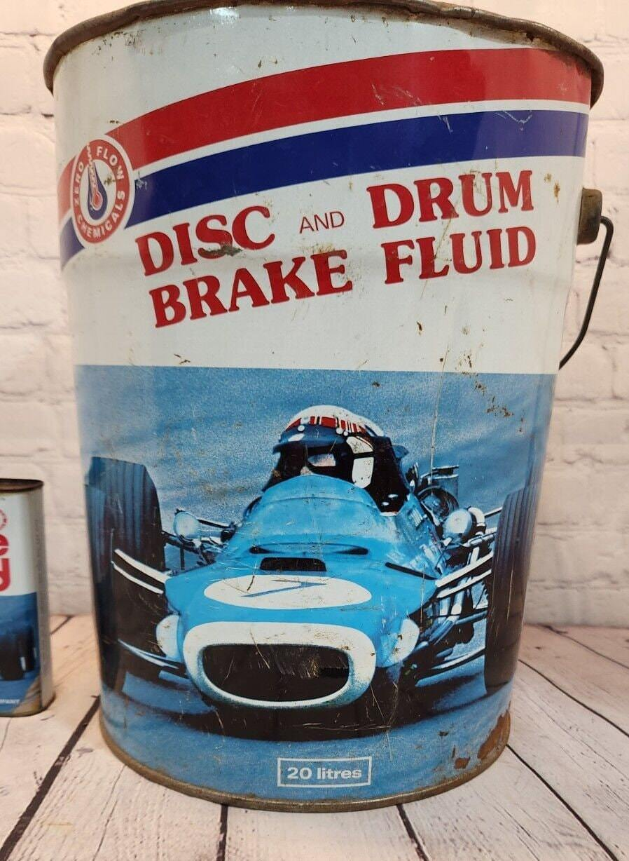 Great combo of Vintage zero flow collectables from the 1960's . A   5 Vintage Zero Flow 5 gallon can and 16 on can brake fluid from the 1960s.  Both can displays great  vintage racing car graphicsThis original Canadian classic featuresChas Vintage ShopGreat combo