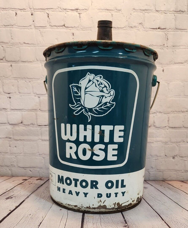 Vintage white rose heavy duty motor oil  5 gallon vintage cdn classic This vintage 5 gallon can of White Rose Motor Oil is a rare find for collectors of gas and oil memorabilia. English and french sided.Made in Canada, this original caChas Vintage ShopVintage white rose heavy duty motor oil 5 gallon vintage cdn classic oil gas Canadian Petrolinia