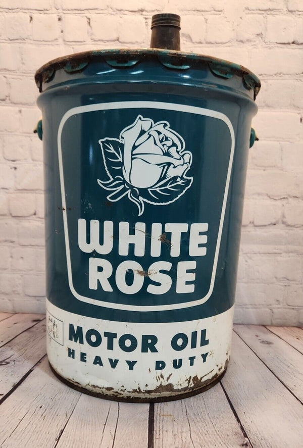 Vintage white rose heavy duty motor oil  5 gallon vintage cdn classic This vintage 5 gallon can of White Rose Motor Oil is a rare find for collectors of gas and oil memorabilia. English and french sided.Made in Canada, this original caChas Vintage ShopVintage white rose heavy duty motor oil 5 gallon vintage cdn classic oil gas Canadian Petrolinia