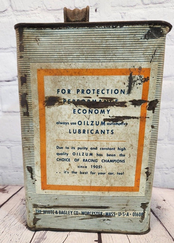 Vintage Oilzum motor oil  1 gallon VTG Oilzum collectable choice of chVintage Oilzum Motor Oil 1 gallon can from the 50'sThis original collectable comes in multi-color and features the brand Oilzum. Perfect for collectors of Gas & Chas Vintage ShopVintage Oilzum motor oil 1 gallon VTG Oilzum collectable choice