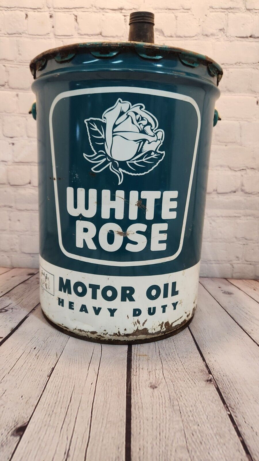 Vintage white rose heavy duty motor oil  5 gallon vintage cdn classic This vintage 5 gallon can of White Rose Motor Oil is a rare find for collectors of gas and oil memorabilia. English and french sided.Made in Canada, this original caChas Vintage ShopVintage white rose heavy duty motor oil 5 gallon vintage cdn classic oil gas Canadian Petrolinia