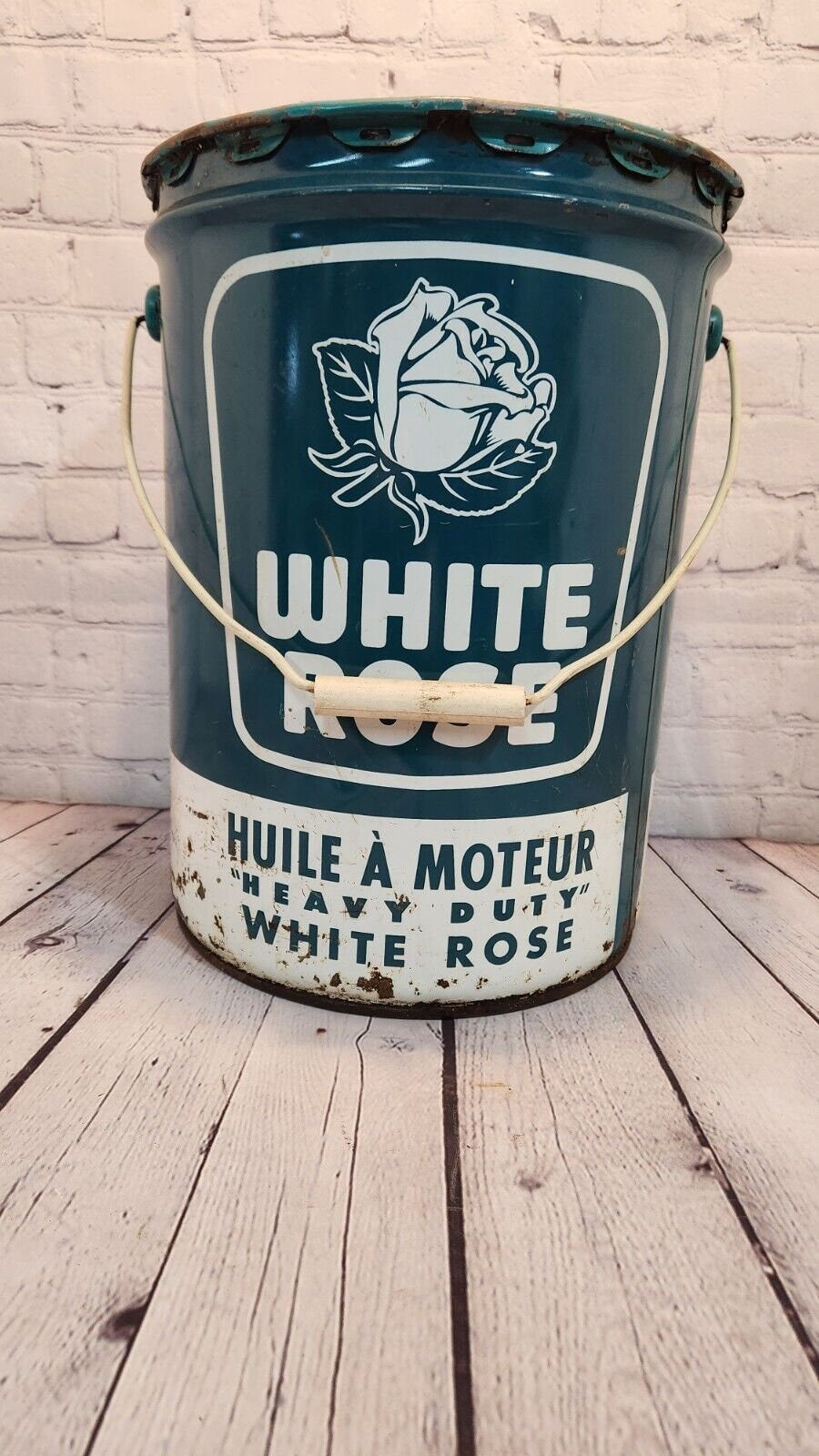 Vintage white rose heavy duty motor oil  5 gallon vintage cdn classic This vintage 5 gallon can of White Rose Motor Oil is a rare find for collectors of gas and oil memorabilia. English and french sided.Made in Canada, this original caChas Vintage ShopVintage white rose heavy duty motor oil 5 gallon vintage cdn classic oil gas Canadian Petrolinia