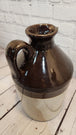 E. swasey co. portland maine 1 gallon brown beige  jug from 1800's earThis rare antique1 gallon jug from E. Swasey and CO is a true collector's item. This 1 gallon stoneware jug boasts a classic brown and beige colour scheme that exudeChas Vintage Shopportland maine 1 gallon brown beige jug