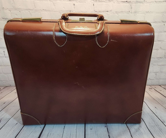 Vintage brown leather suitecase smaller  size vintage suitcase  mid ceVintage brown leather suitecase SMALLER size of a set of 3 vintage suitcases Mid Century suitecase with protective canvas. Canada Cowhide vintage suitcaseThis vintagChas Vintage ShopVintage brown leather suitecase smaller size vintage suitcase mid century suitecase / protective canvas