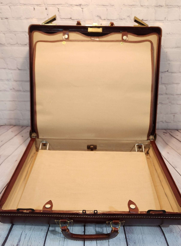 Vintage brown leather suitecase smaller  size vintage suitcase  mid ceVintage brown leather suitecase SMALLER size of a set of 3 vintage suitcases Mid Century suitecase with protective canvas. Canada Cowhide vintage suitcaseThis vintagChas Vintage ShopVintage brown leather suitecase smaller size vintage suitcase mid century suitecase / protective canvas