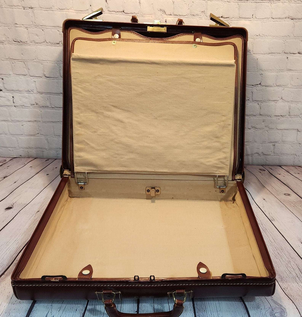 Vintage brown leather suitecase smaller  size vintage suitcase  mid ceVintage brown leather suitecase SMALLER size of a set of 3 vintage suitcases Mid Century suitecase with protective canvas. Canada Cowhide vintage suitcaseThis vintagChas Vintage ShopVintage brown leather suitecase smaller size vintage suitcase mid century suitecase / protective canvas