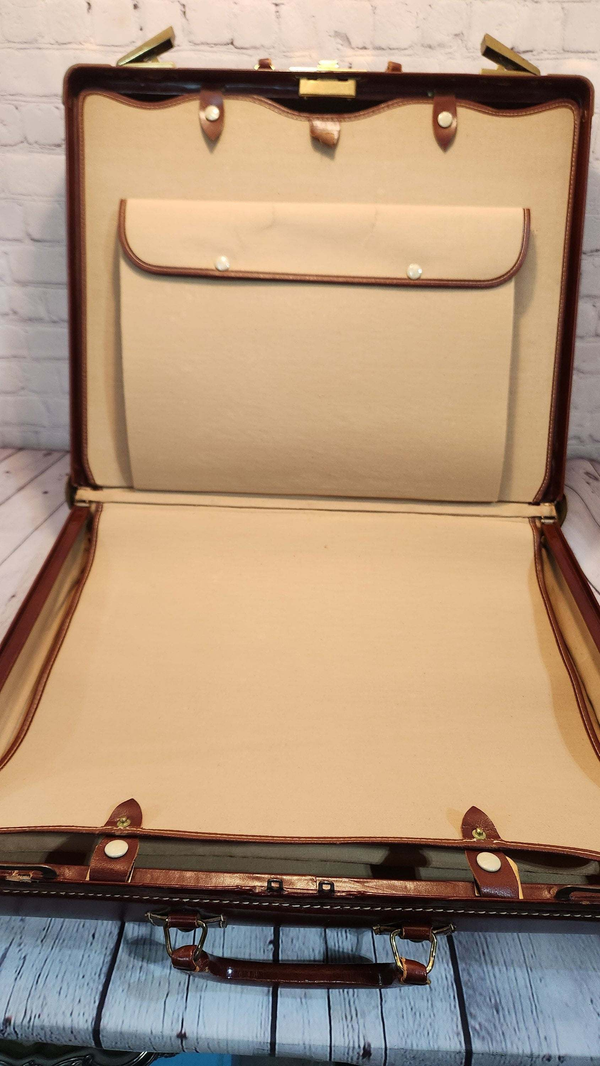 Vintage brown leather suitecase smaller  size vintage suitcase  mid ceVintage brown leather suitecase SMALLER size of a set of 3 vintage suitcases Mid Century suitecase with protective canvas. Canada Cowhide vintage suitcaseThis vintagChas Vintage ShopVintage brown leather suitecase smaller size vintage suitcase mid century suitecase / protective canvas