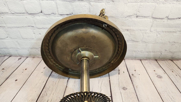 Mid century modern standing brass finish ashtray made in 60's  wtih 2 Mid century modern standing ashtray made in the 60'Brass finish with a globe in the middle and 2 Cherubs decorate the baseThis ashtray has a very elegant shape to itChas Vintage ShopMid century modern standing brass finish ashtray made