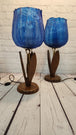 Pair of vintage blue tulip taple lamps kitsch mid century  blue tulip Add a touch of mid-century modern style to your home with this pair of vintage Blue tulip table lamps. The kitschy design and blue light color make these lamps a perChas Vintage Shopvintage blue tulip taple lamps kitsch mid century blue tulip table lamp