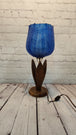 Pair of vintage blue tulip taple lamps kitsch mid century  blue tulip Add a touch of mid-century modern style to your home with this pair of vintage Blue tulip table lamps. The kitschy design and blue light color make these lamps a perChas Vintage Shopvintage blue tulip taple lamps kitsch mid century blue tulip table lamp