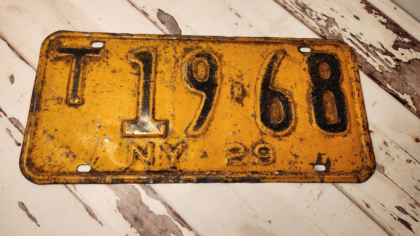 1929 New York licence plates Vintage New York licence plate from 1929 This vintage New York licence plate from 1929 features a low number and is a unique addition to any collection.
 Made in the United States, this piece of automobiliaChas Vintage ShopYork licence plates Vintage