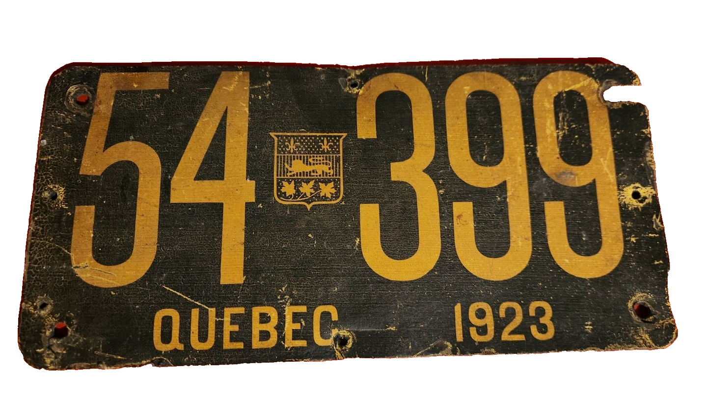 WOW 1923 Quebec antique  licence plate . Plaque immatriculation  du QuThis antique 1923 Quebec licence plate is a rare and valuable find for collectors of Canadian automobilia.1923 is showcasing Quebec coat of arms , the only year. VisChas Vintage ShopWOW 1923 Quebec antique licence plate