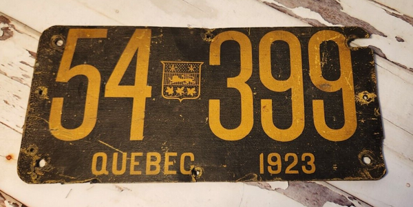 WOW 1923 Quebec antique  licence plate . Plaque immatriculation  du QuThis antique 1923 Quebec licence plate is a rare and valuable find for collectors of Canadian automobilia.1923 is showcasing Quebec coat of arms , the only year. VisChas Vintage ShopWOW 1923 Quebec antique licence plate